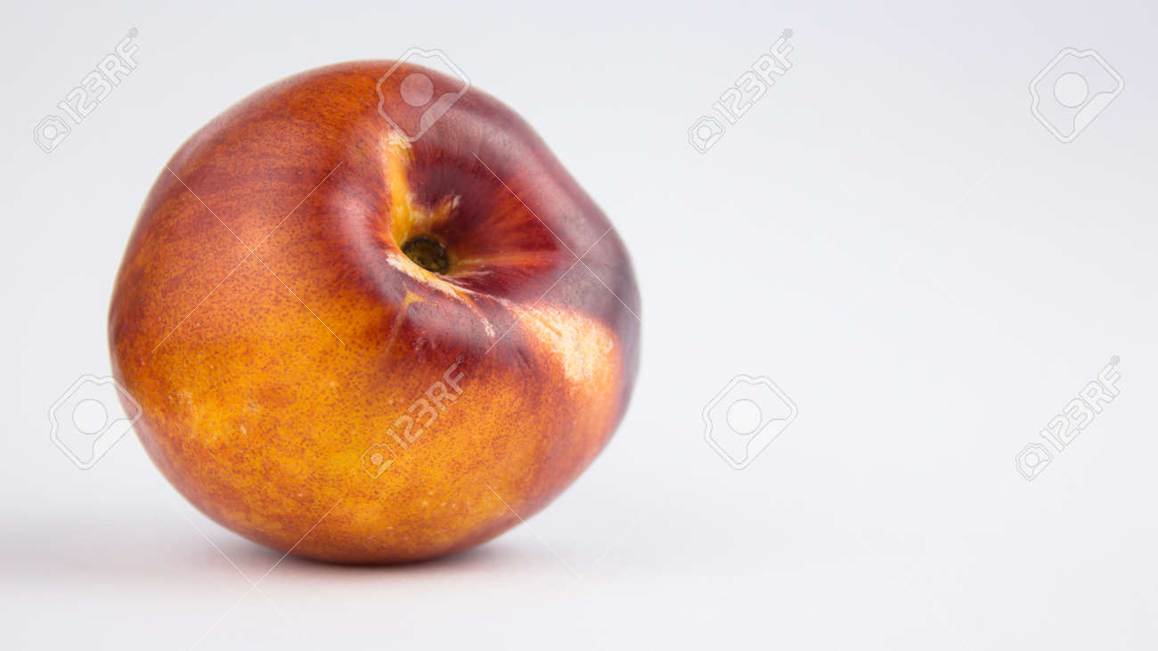 Fresh juicy peaches on a white plate. Close-up Fresh organic peaches nectarine on a white plate. - 152947792 Fresh juicy peaches on a white plate. Close-up Fresh organic peaches nectarine on a white plate. - 152947792