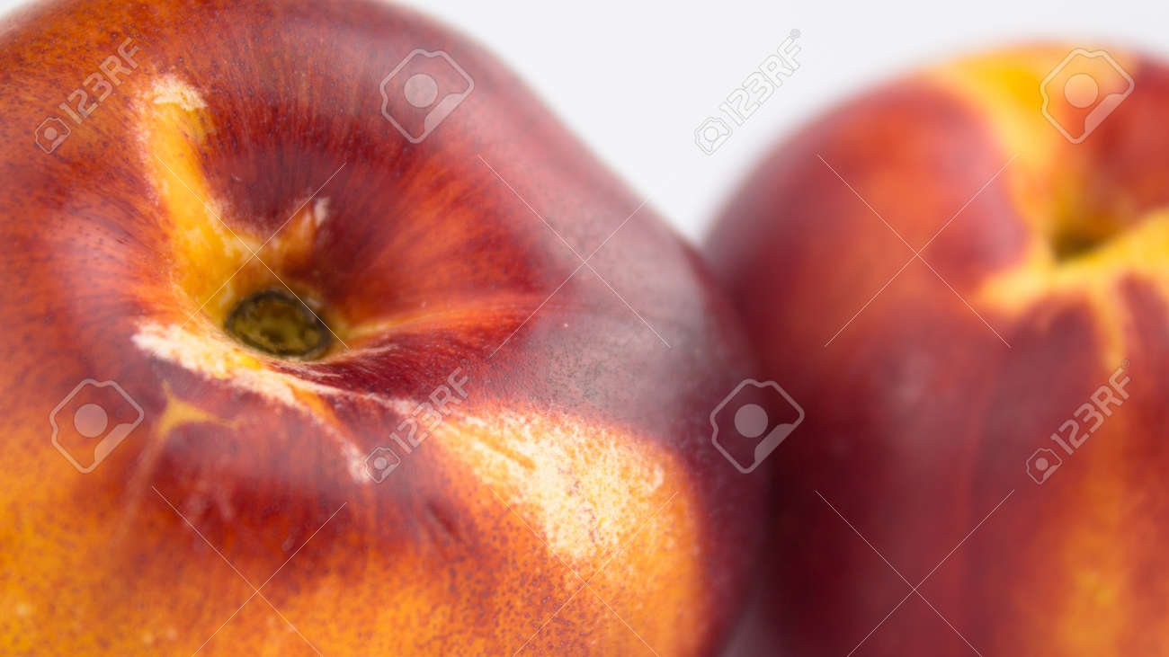 Fresh juicy peaches on a white plate. Close-up Fresh organic peaches nectarine on a white plate. - 152883535 Fresh juicy peaches on a white plate. Close-up Fresh organic peaches nectarine on a white plate. - 152883535