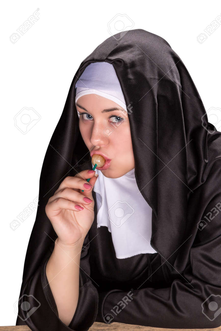Beautiful Nun Sucks A Lollipop Isolated On White Background Stock Photo,  Picture and Royalty Free Image. Image 54623016.