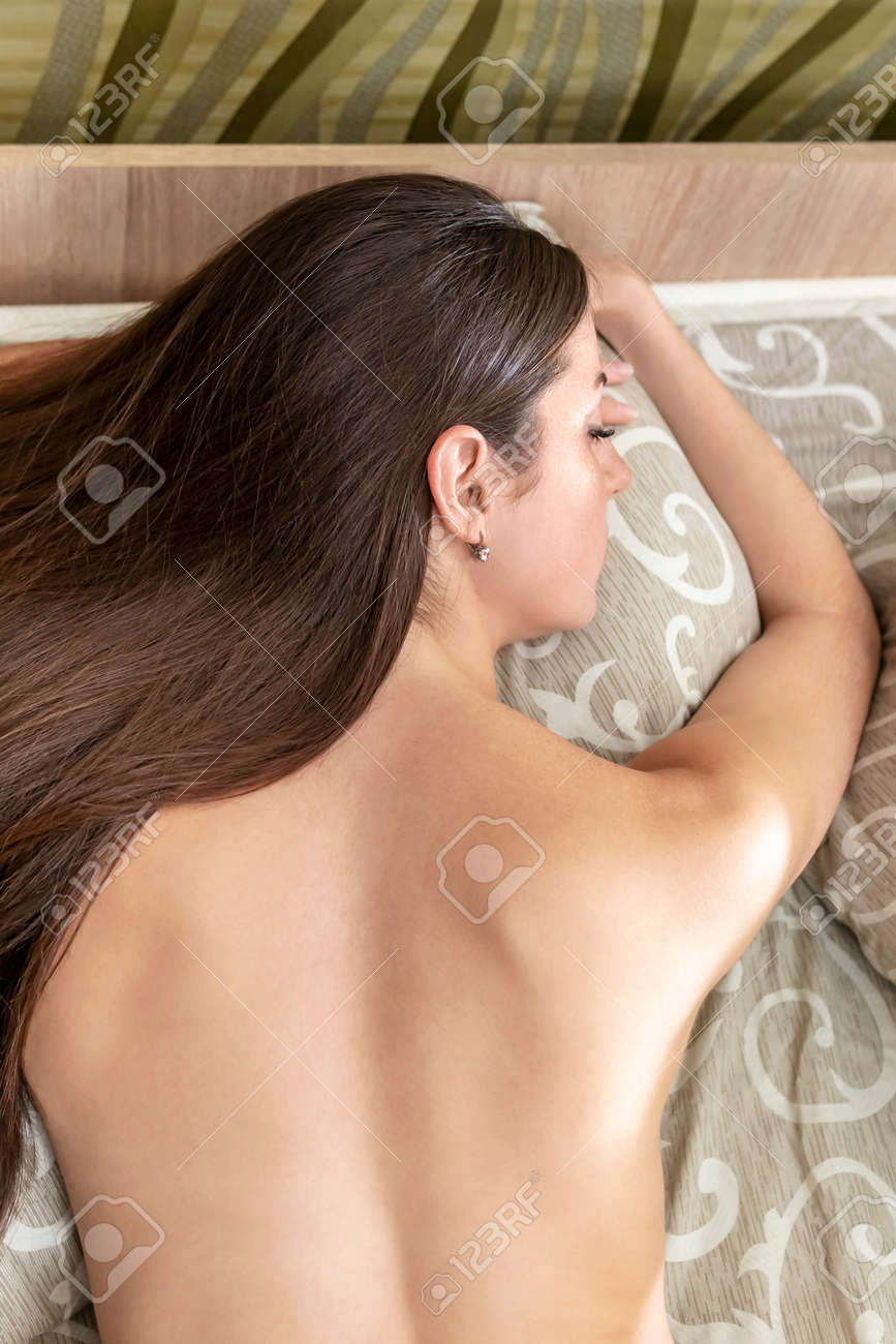 Naked Women Looking Behind Her