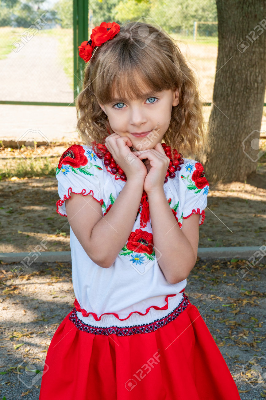 portrait of a beautiful little preschool girl wearing an embroidered shirt - national Ukrainian costume - 166632226 portrait of a beautiful little preschool girl wearing an embroidered shirt - national Ukrainian costume - 166632226
