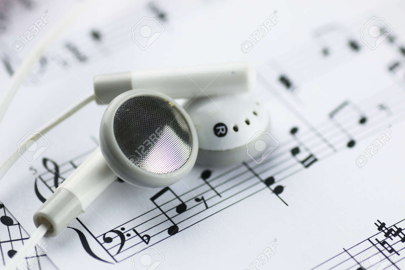 of paper white with with sheet printed musical Christmas.. notes