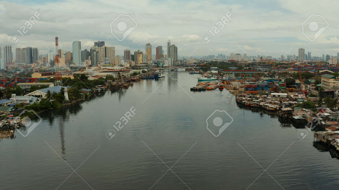Populous city of Manila, the capital of the Philippines with skyscrapers, streets and buildings. Travel vacation concept. - 168138052 Populous city of Manila, the capital of the Philippines with skyscrapers, streets and buildings. Travel vacation concept. - 168138052