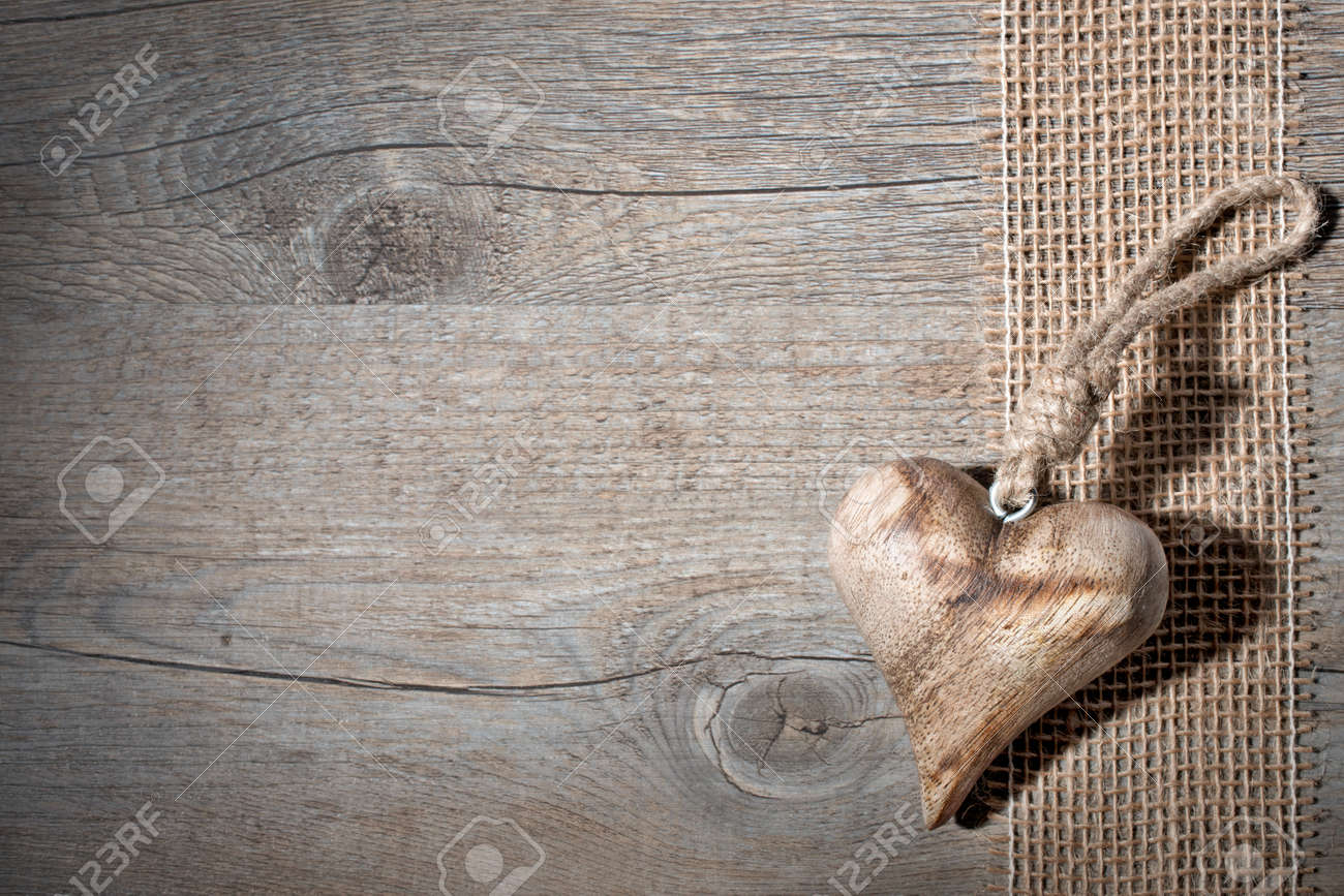 Carved Wooden Heart On A Grey Background Stock Photo Carved Wooden Heart On A Grey Background Stock Photo
