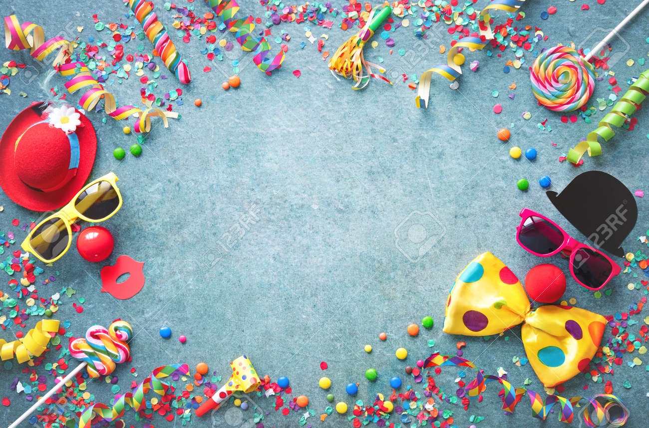 Colorful Carnival Or Party Background Streamers And Confetti And Funny  Faces Formed From Bow Tie, Hat, Eyeglasses And Lips Stock Photo, Picture  and Royalty Free Image. Image 138103554.