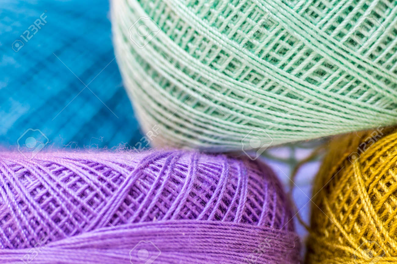 rows of colorful yarns