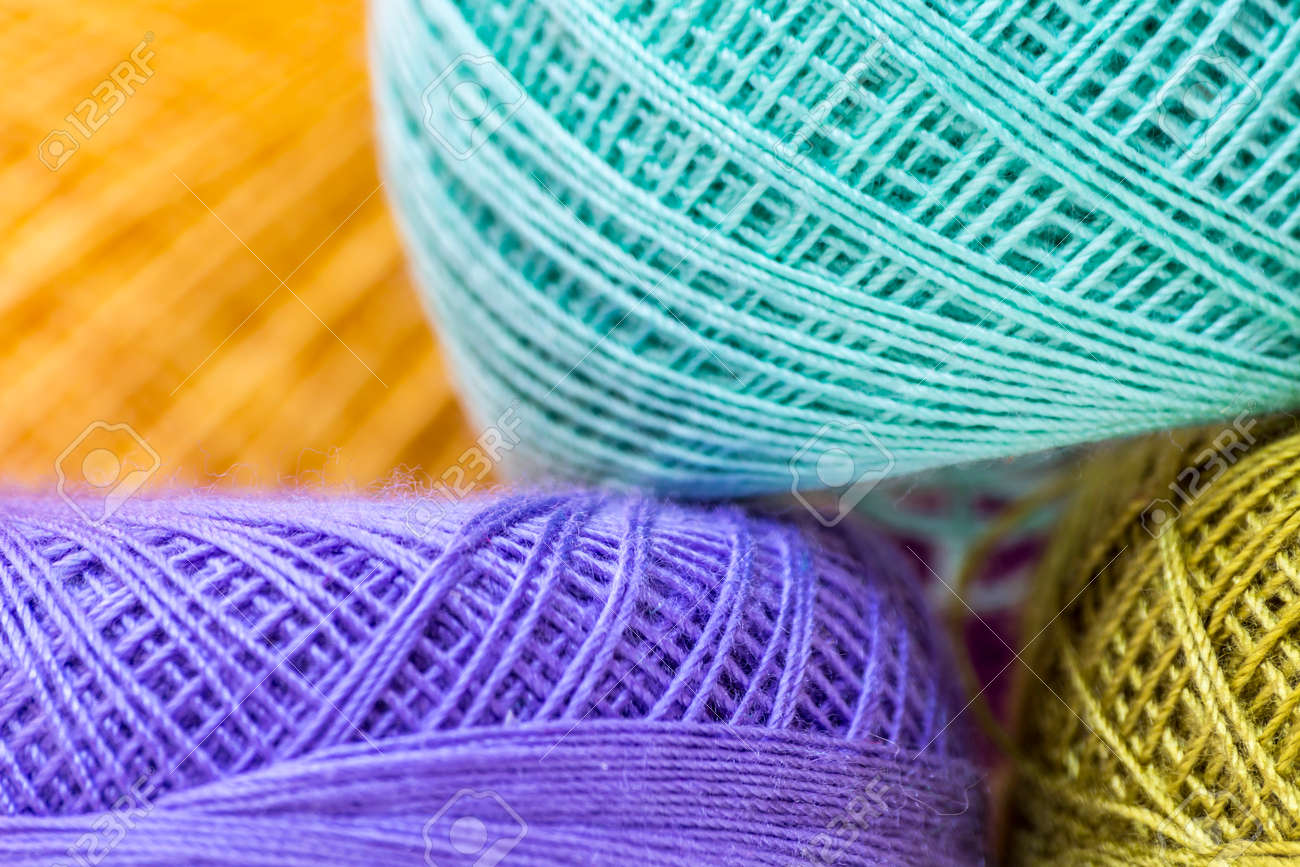 rows of colorful yarns