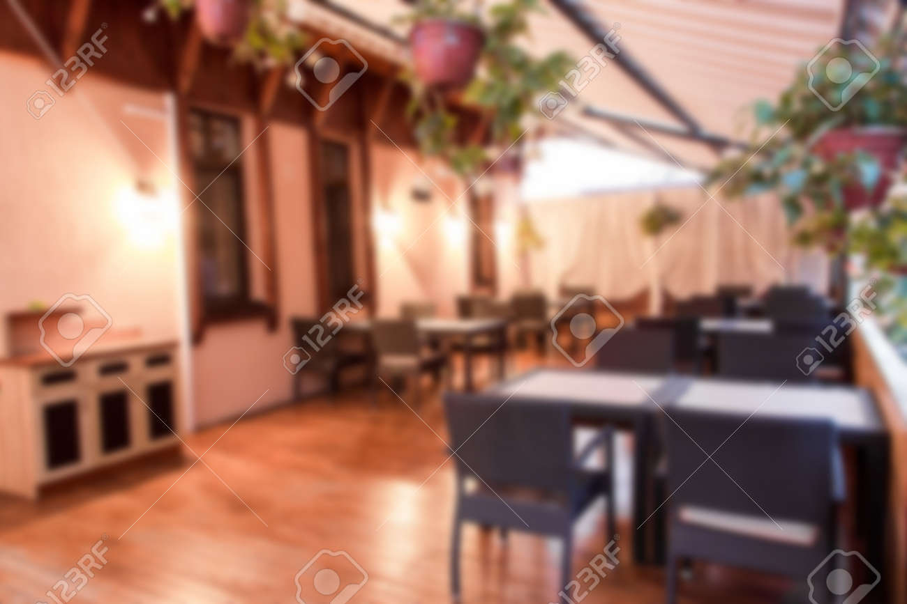 Restaurant Background With People blurred background summer terrace in a restaurant without people Restaurant Background With People blurred background summer terrace in a restaurant without people