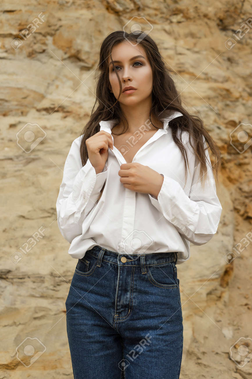 white blouse blue jeans