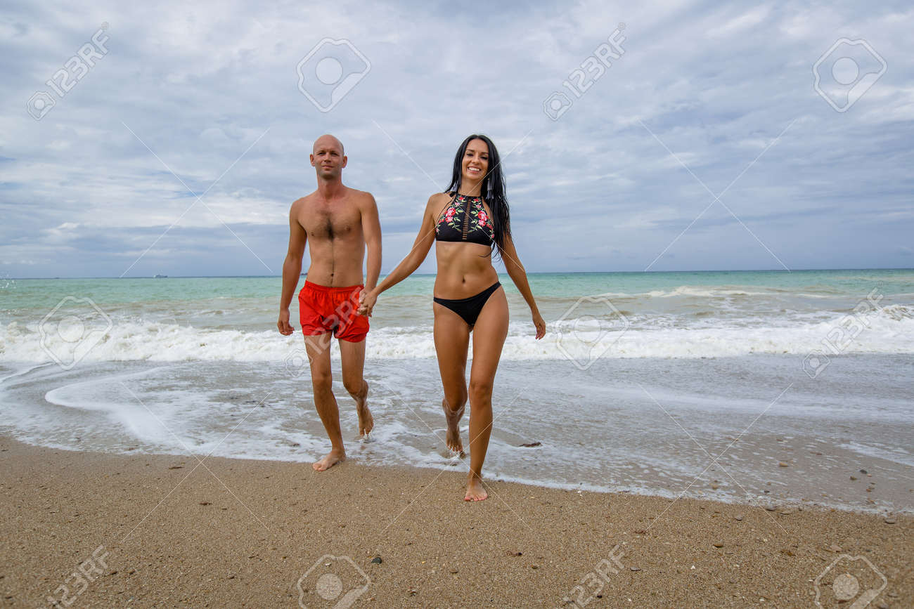 Attractive Couple At The Sea In Summer