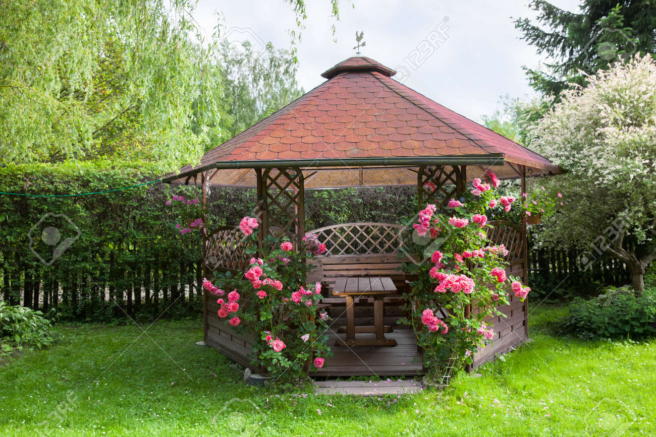Outdoor Wooden Gazebo With Roses And Summer Landscape Background Stock Photo 60075832 Outdoor Wooden Gazebo With Roses And Summer Landscape Background Stock Photo 60075832