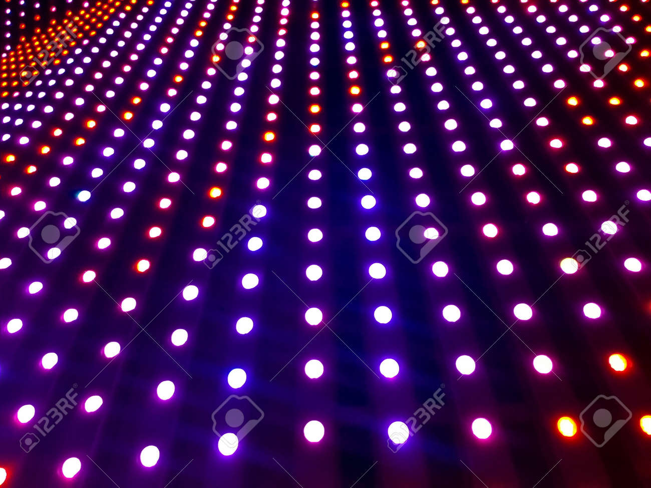 Neon Light Bulbs >> Abstract Led Wall With Soft Focus Rows Neon Light Bulbs On Dark Neon Light Bulbs >> Abstract Led Wall With Soft Focus Rows Neon Light Bulbs On Dark
