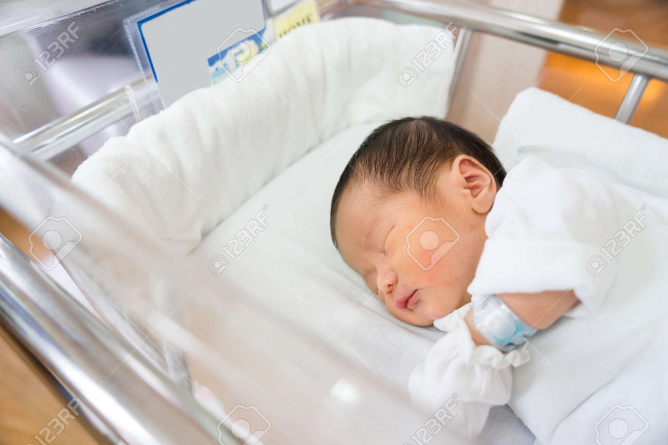 Asian newborn baby in hospital, delivery room - 51373436 Asian newborn baby in hospital, delivery room - 51373436