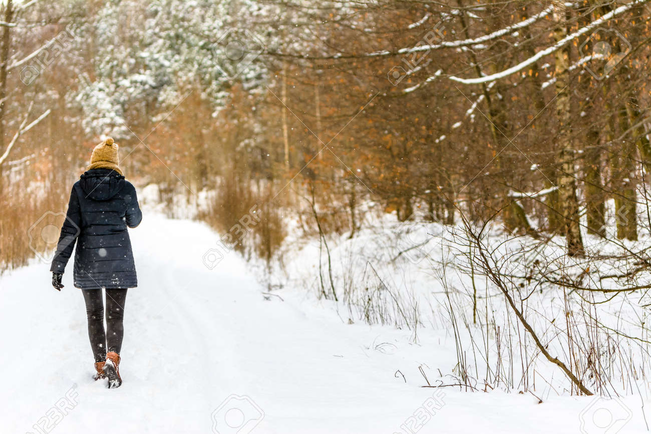 girl walking in snow