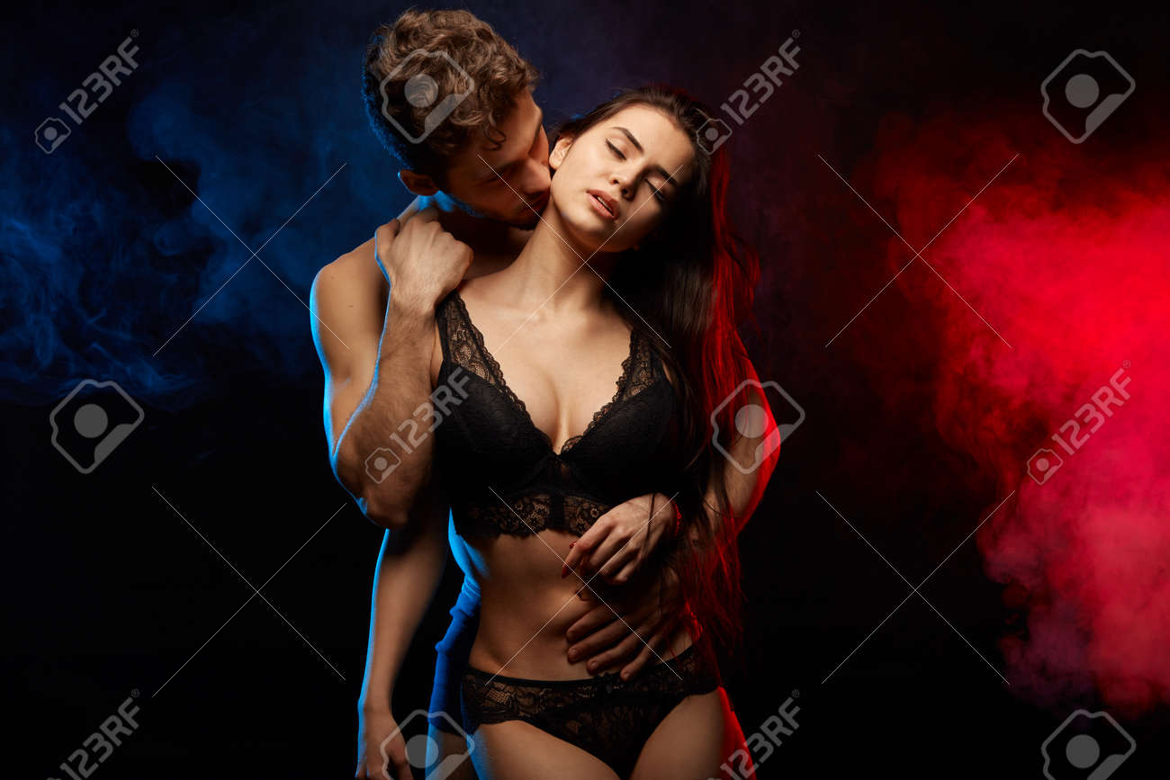 Man Sucking Woman On Her Neck.close Up Photo. Isolated Smoky Black  Background Stock Photo, Picture and Royalty Free Image. Image 122596385.