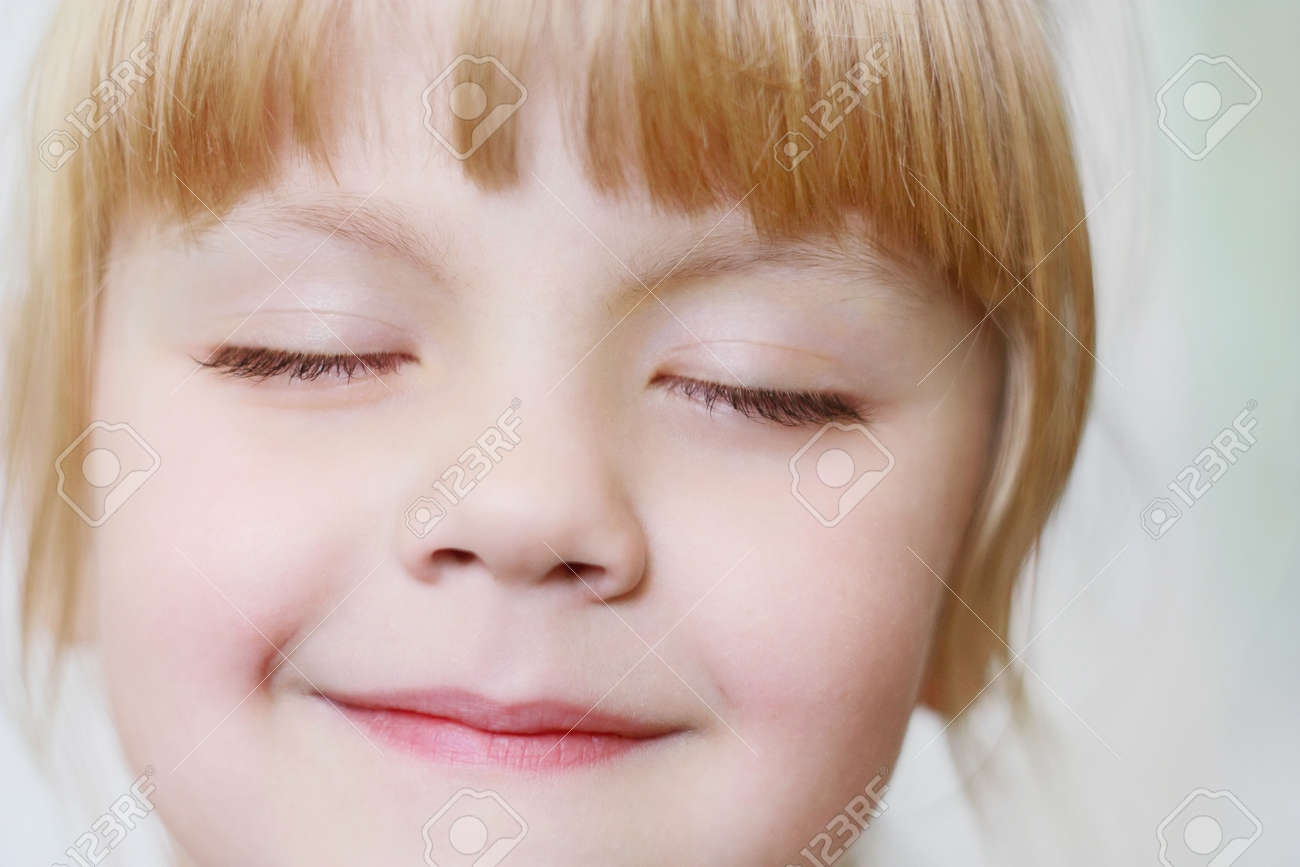 Face of a little girl with closed eyes close-up - 62670238 Face of a little girl with closed eyes close-up - 62670238