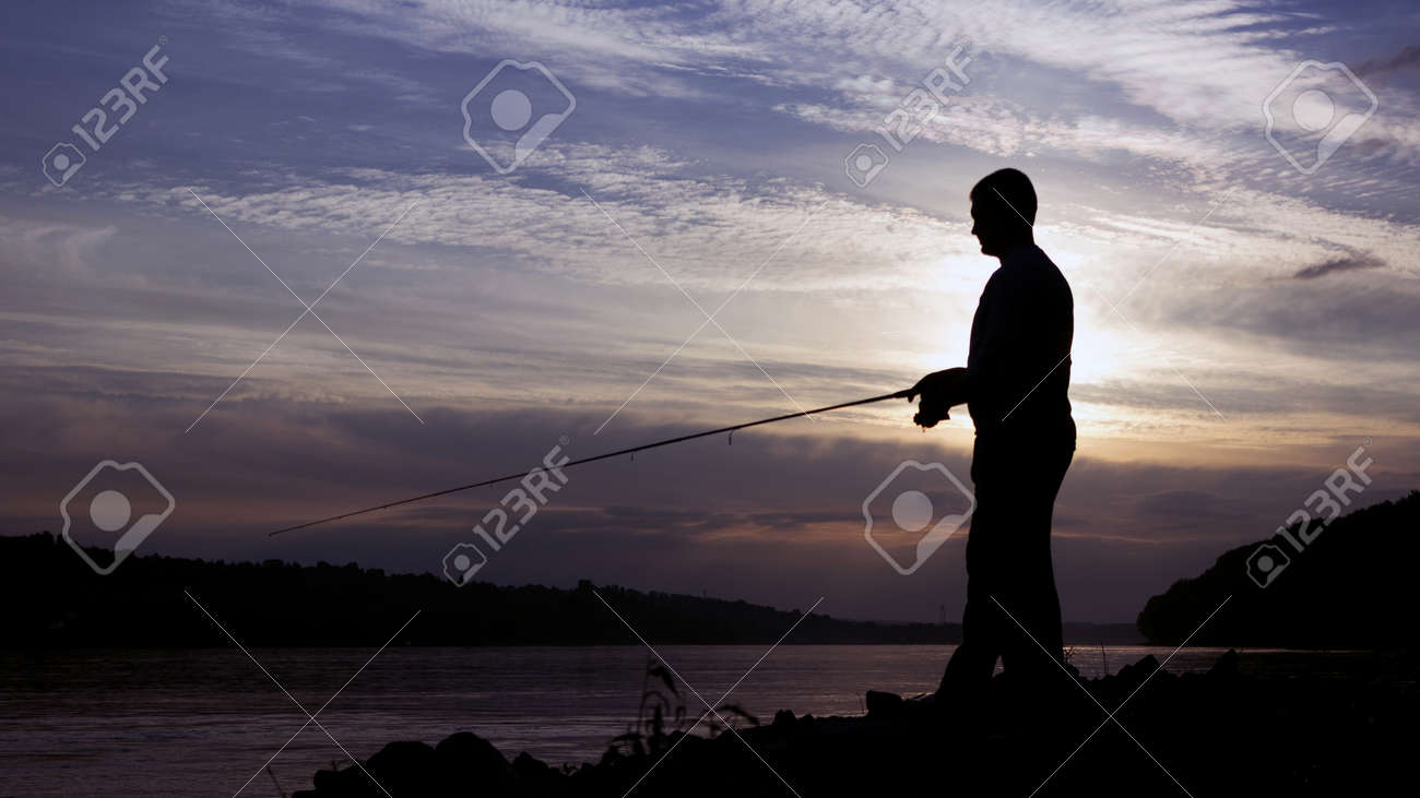 Silhouette of Fisherman on sunset, Fisherman Casting - 46721588 Silhouette of Fisherman on sunset, Fisherman Casting - 46721588