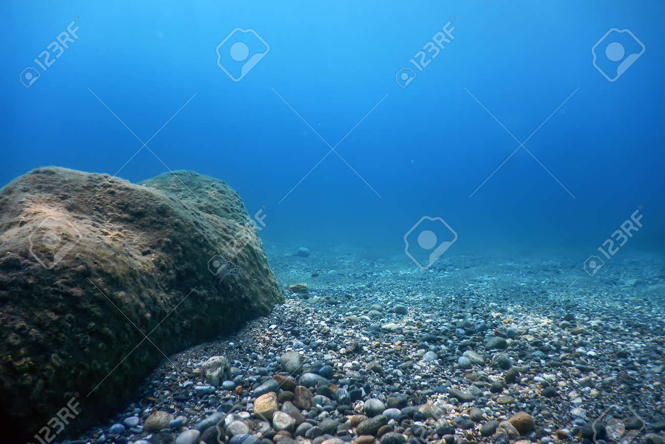 Underwater Rocks And Pebbles On The Seabed Stock Photo, Picture and Royalty  Free Image. Image 130032458., image size:1300x867