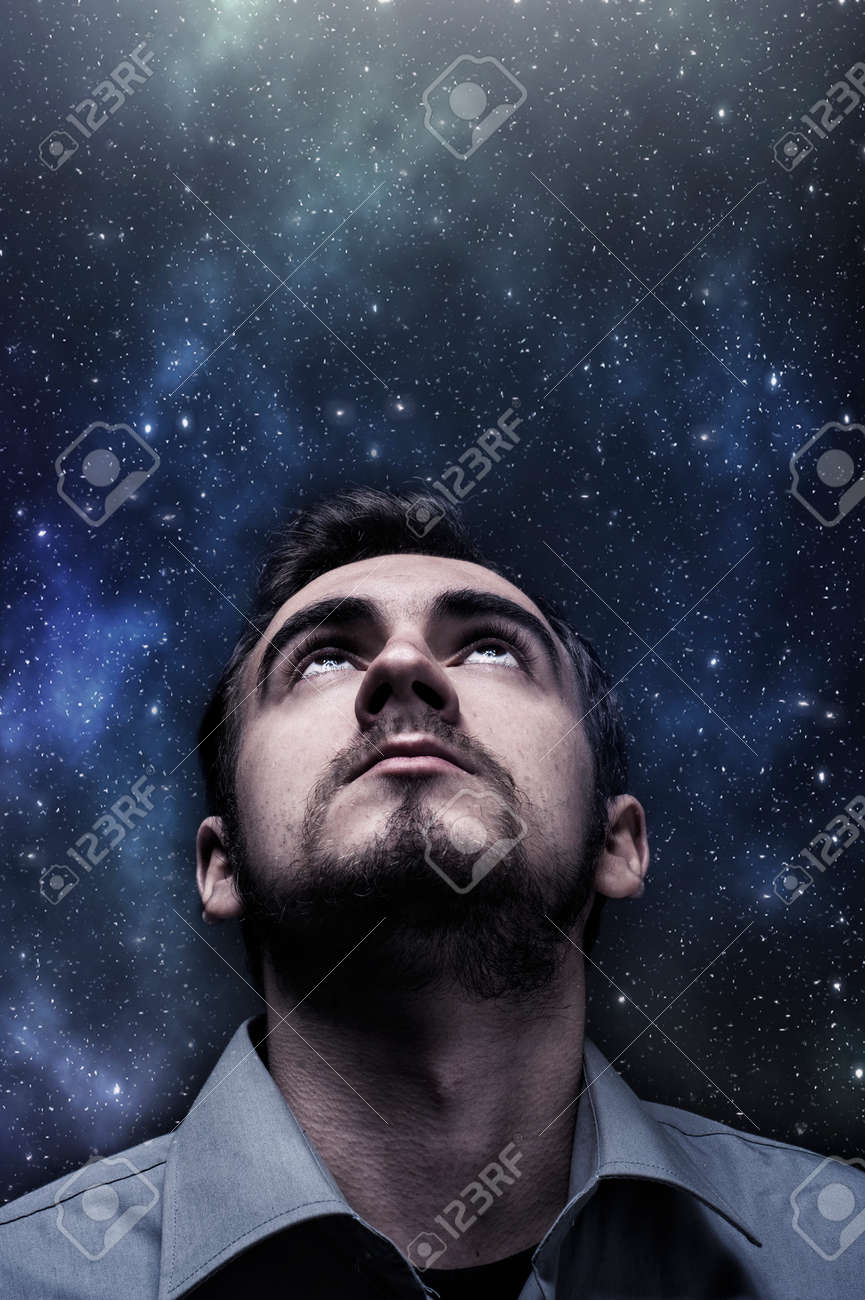 Young Man Looking Up To The Night Sky Stock Photo Picture And