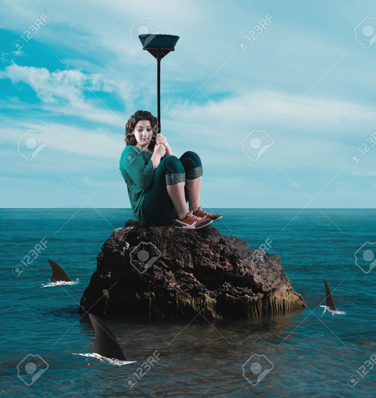 Scared Woman Protect Herself From Sharks With A Broom On A Rock Stock Photo Picture And Royalty Free Image Image