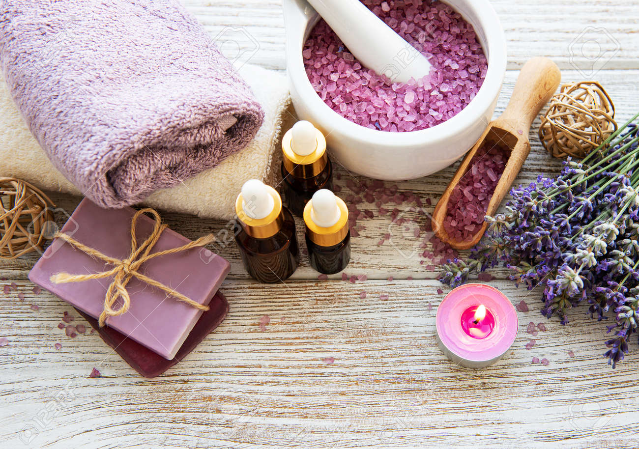 Lavender flowers and natural cosmetic on old wooden background - 128906401 Lavender flowers and natural cosmetic on old wooden background - 128906401