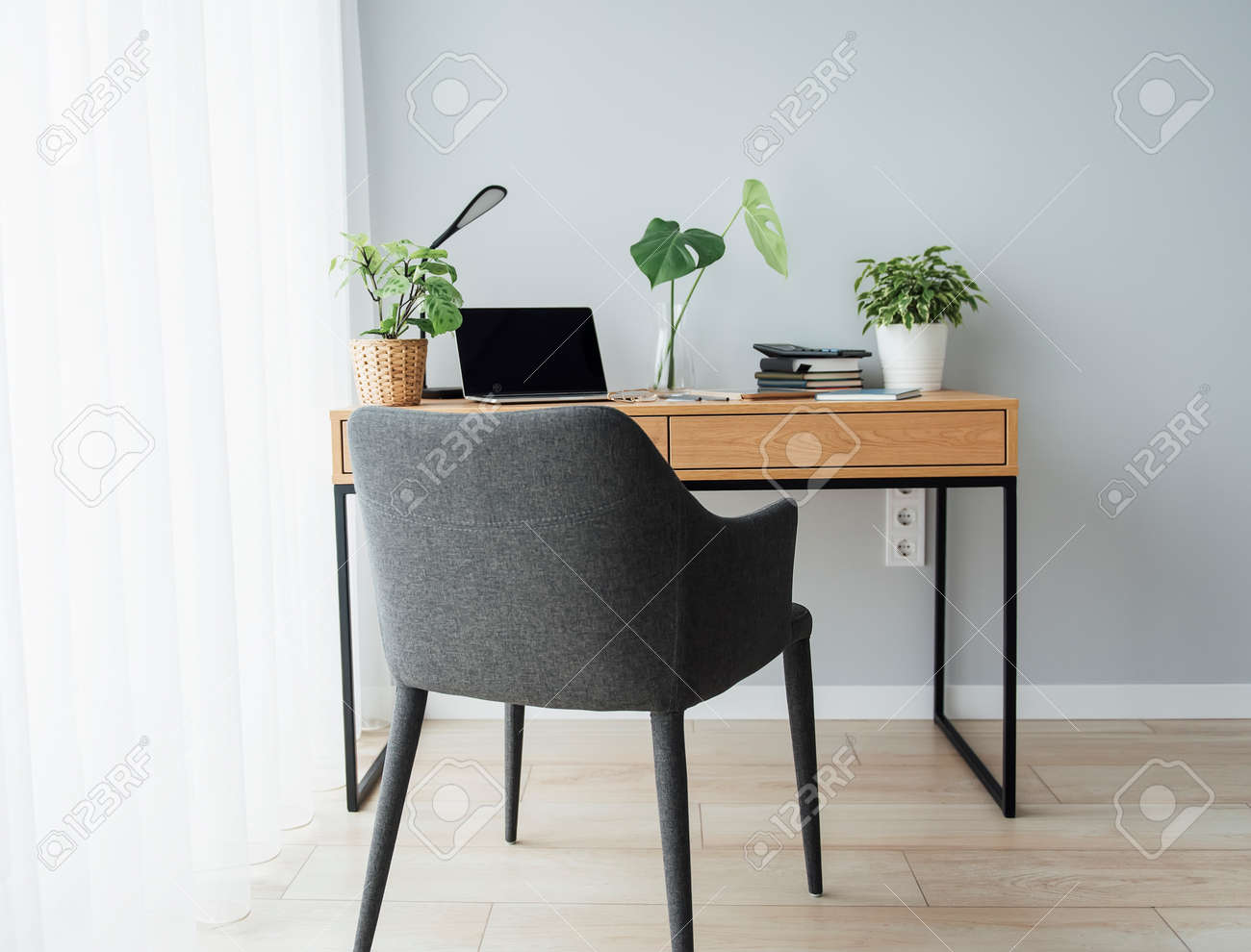 Office workplace with laptop on wooden table - 168964171 Office workplace with laptop on wooden table - 168964171