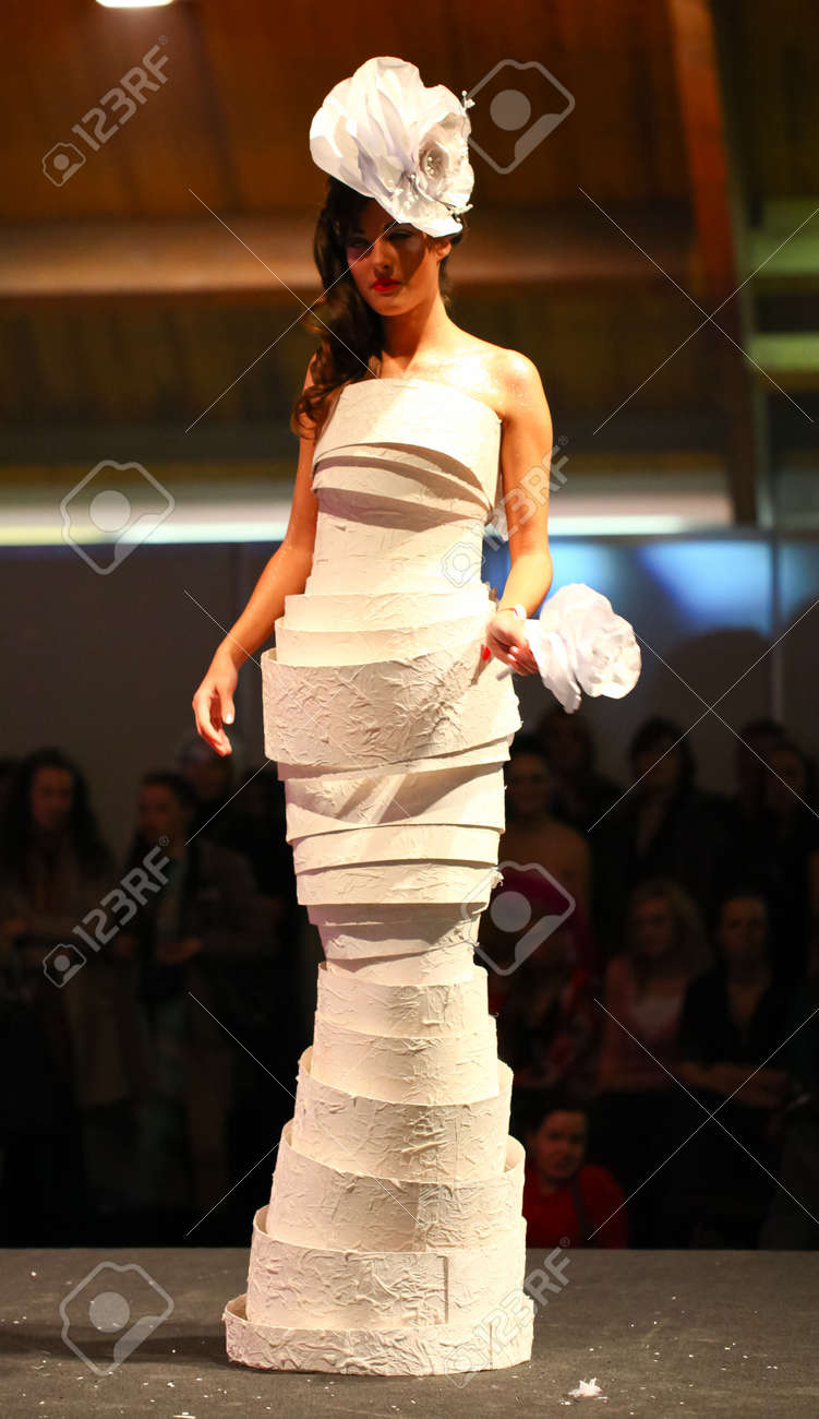 RIGA - APRIL 10: Model showcases of extravagant brides on the catwalk during Fiesta Expo 2011. Wedding and fashion show in hall of Kipsala - April 10, 2011 in Riga, Latvia. - 9434043 RIGA - APRIL 10: Model showcases of extravagant brides on the catwalk during Fiesta Expo 2011. Wedding and fashion show in hall of Kipsala - April 10, 2011 in Riga, Latvia. - 9434043