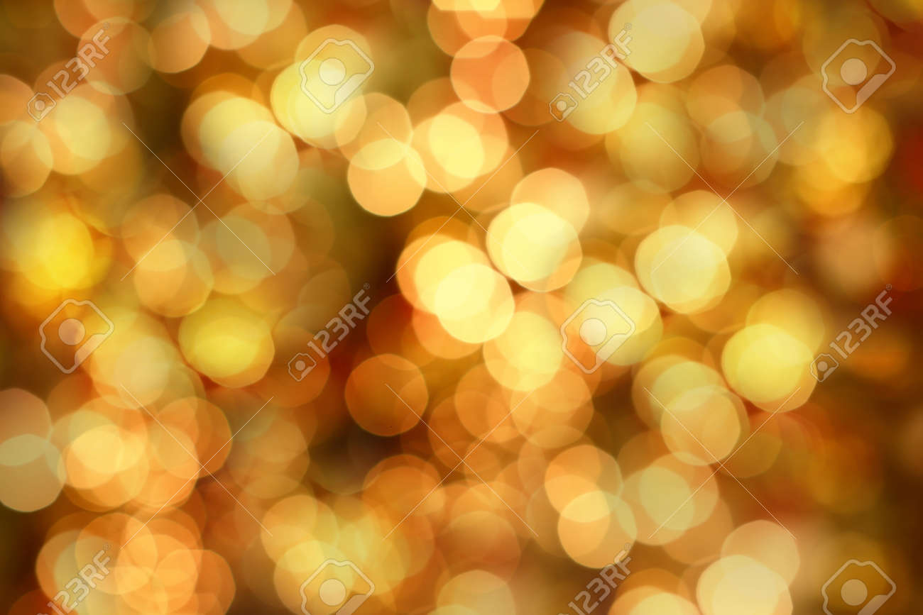 Golden Christmas lights at night. Beautiful blurred background. - 11865485 Golden Christmas lights at night. Beautiful blurred background. - 11865485