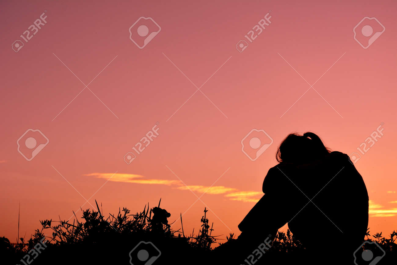 Silhouette Sad Girl At Sunset. Stock Photo, Picture And Royalty ...