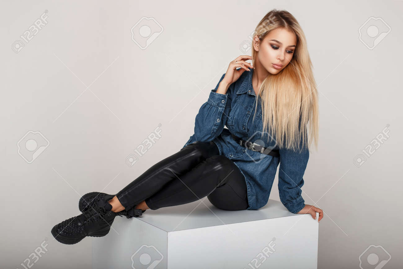 black pants and denim shirt