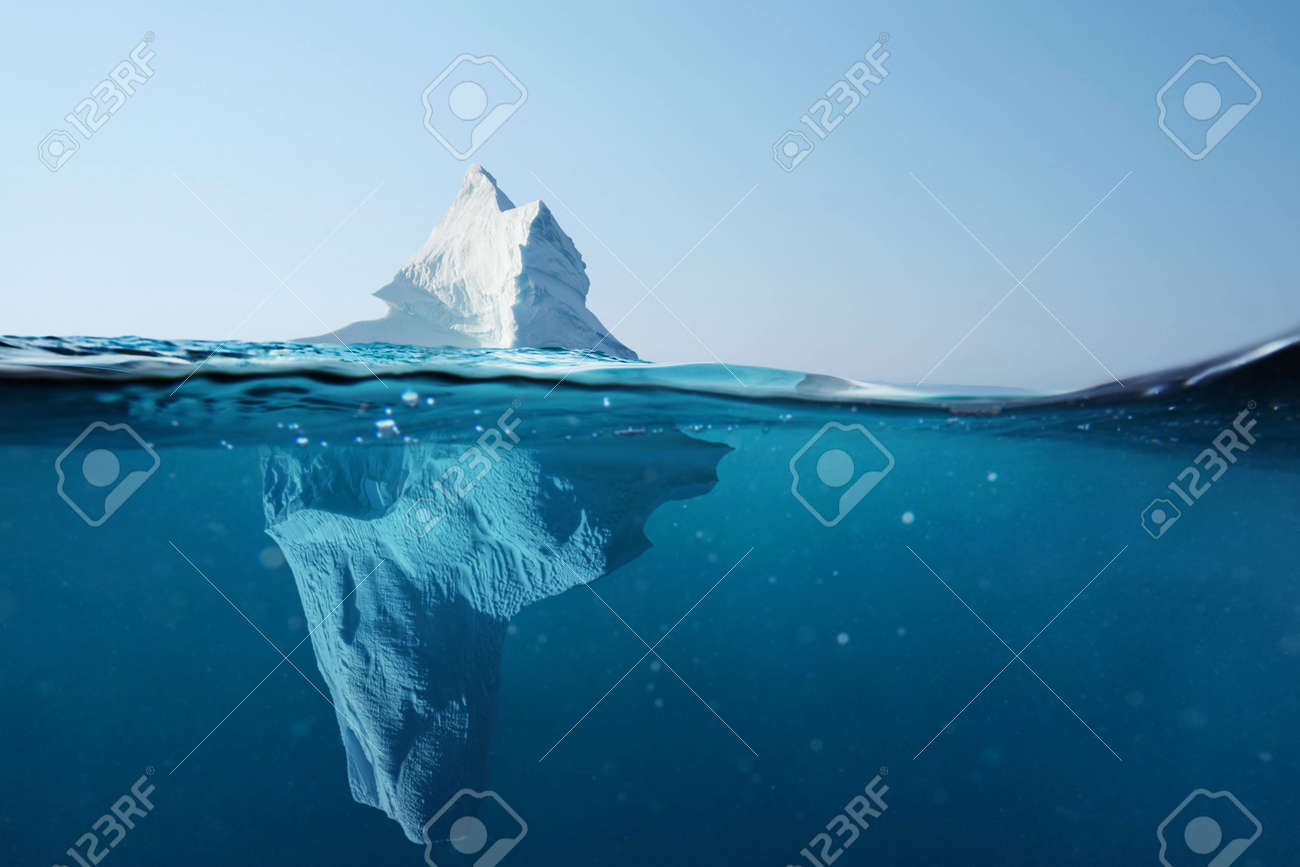 Iceberg in the ocean with a view under water. Crystal clear water. Hidden Danger And Global Warming Concept - 125232818 Iceberg in the ocean with a view under water. Crystal clear water. Hidden Danger And Global Warming Concept - 125232818
