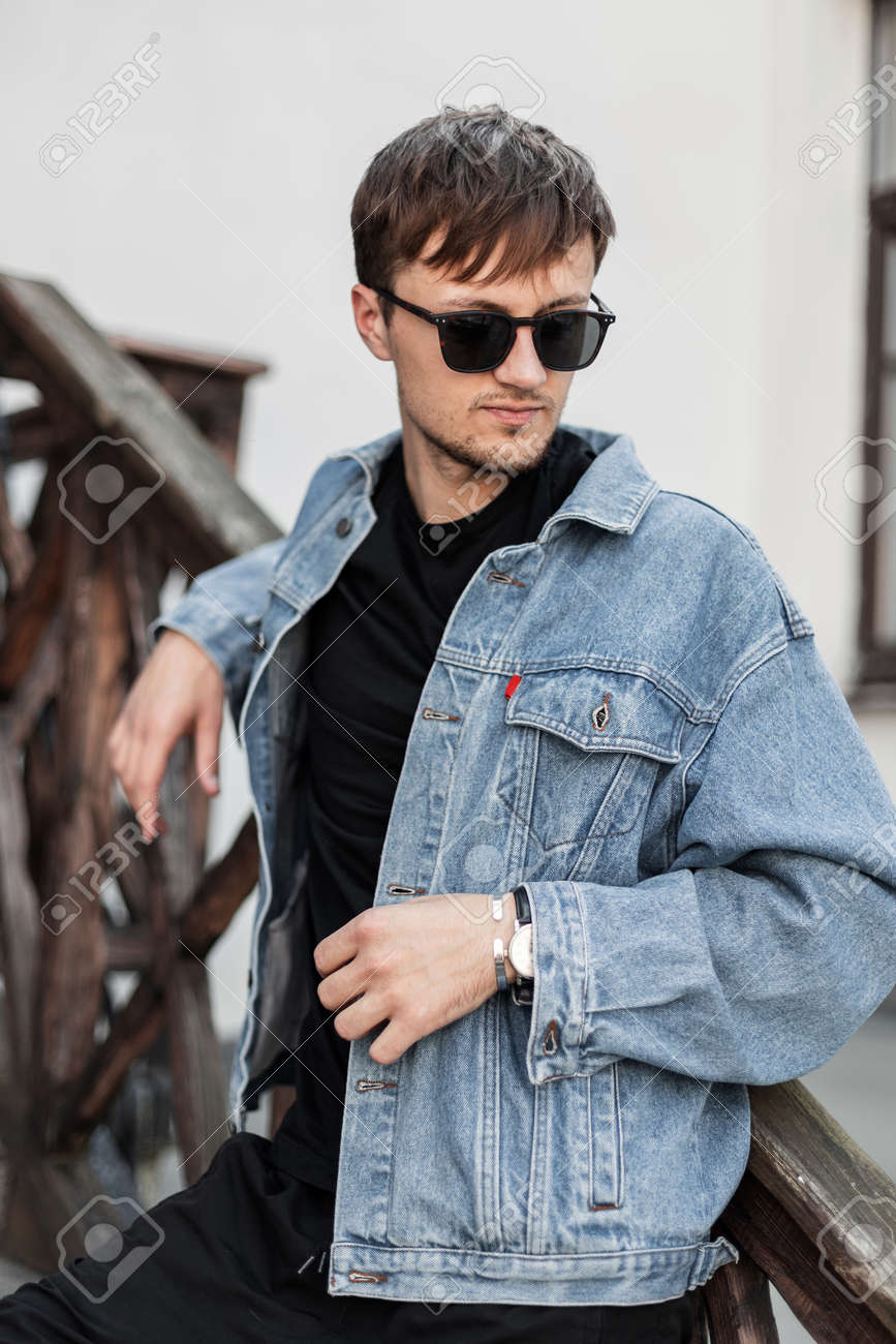 black jeans and blue denim jacket