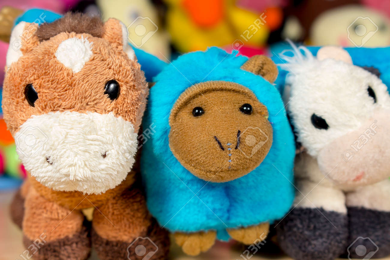 peluche singe bleu
