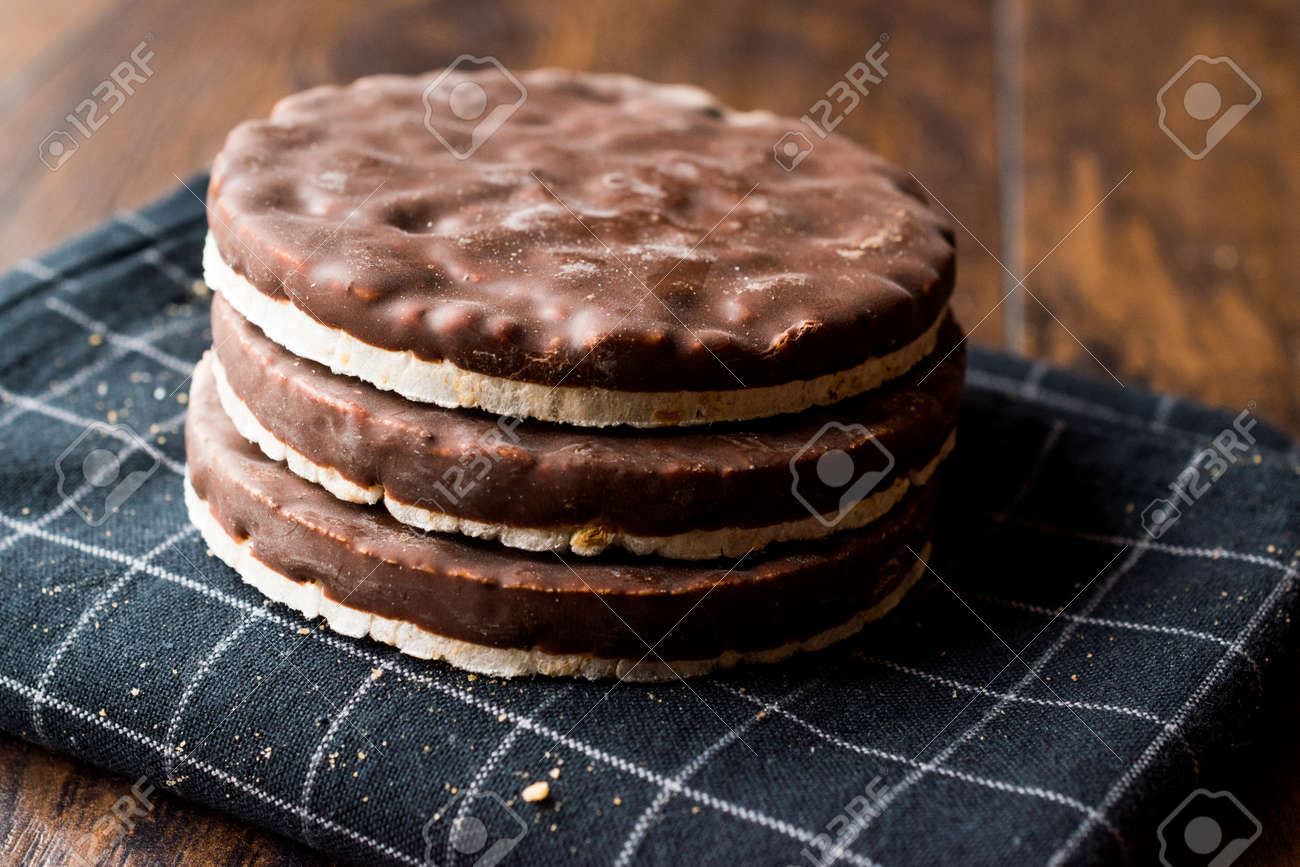 Stack Of Dark Chocolate Covered Rice Cakes or Corn Crackers.