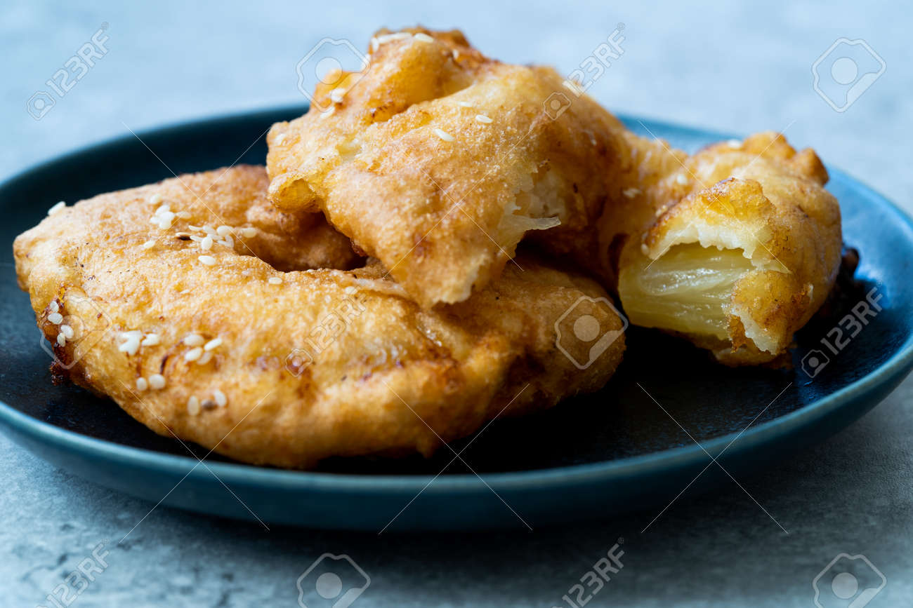 Fried Pineapple Fritters Caramelized With Cinnamon And Sesame Stock Photo Picture And Royalty Free Image Image 135883165