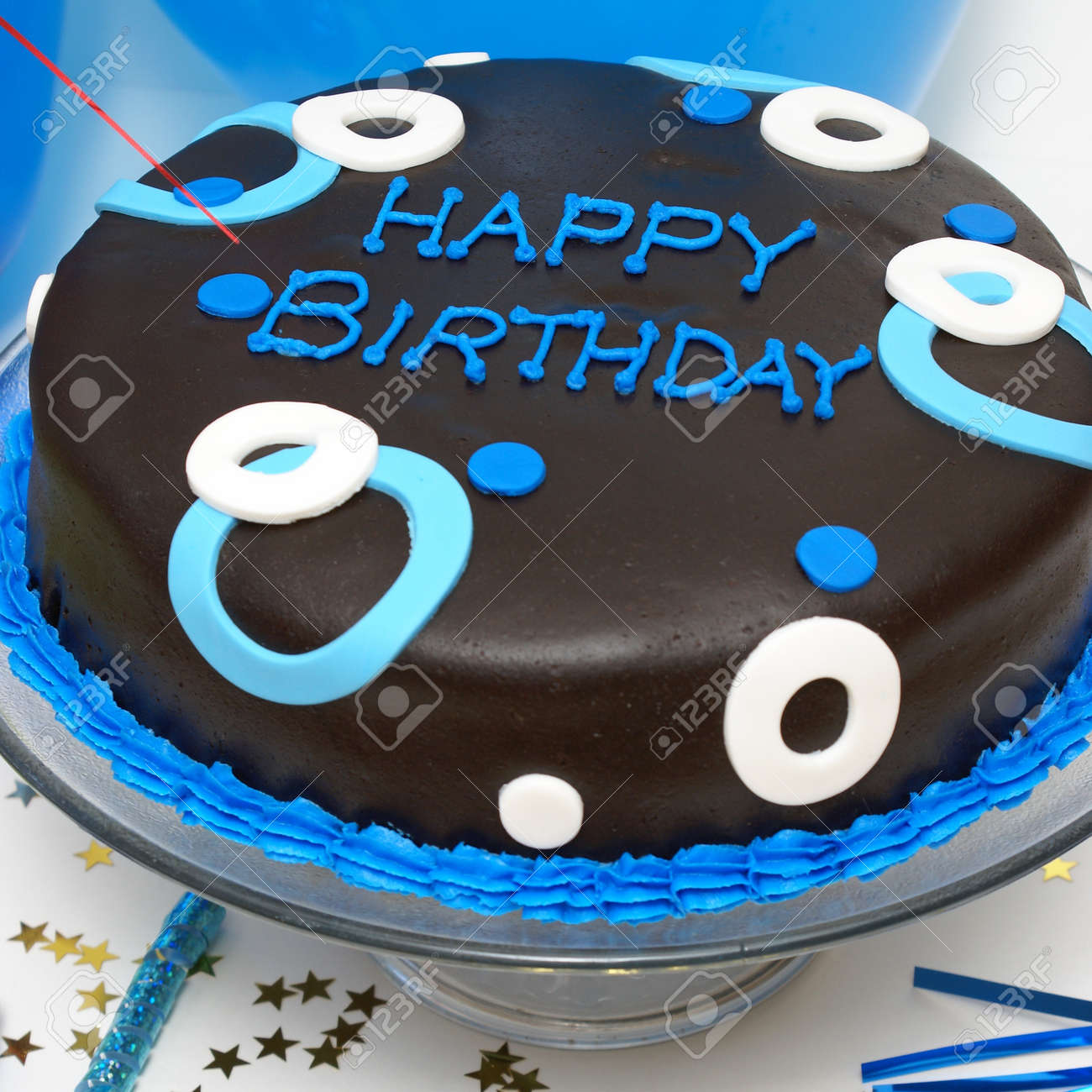 A square format shot of a birthday cake for any males special..