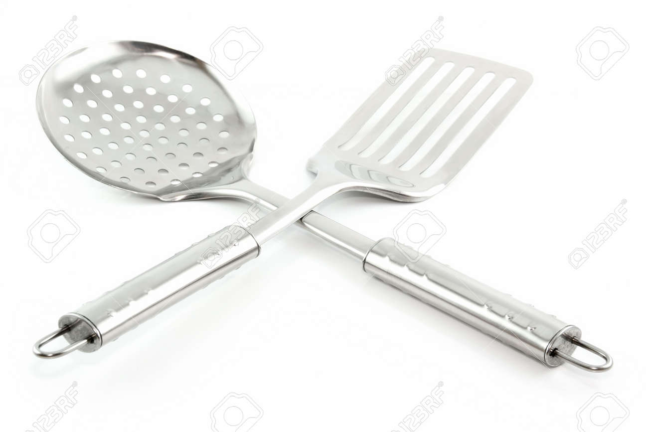 White Kitchen Utensils kitchen utensils (colander and spatula) isolated on white White Kitchen Utensils kitchen utensils (colander and spatula) isolated on white