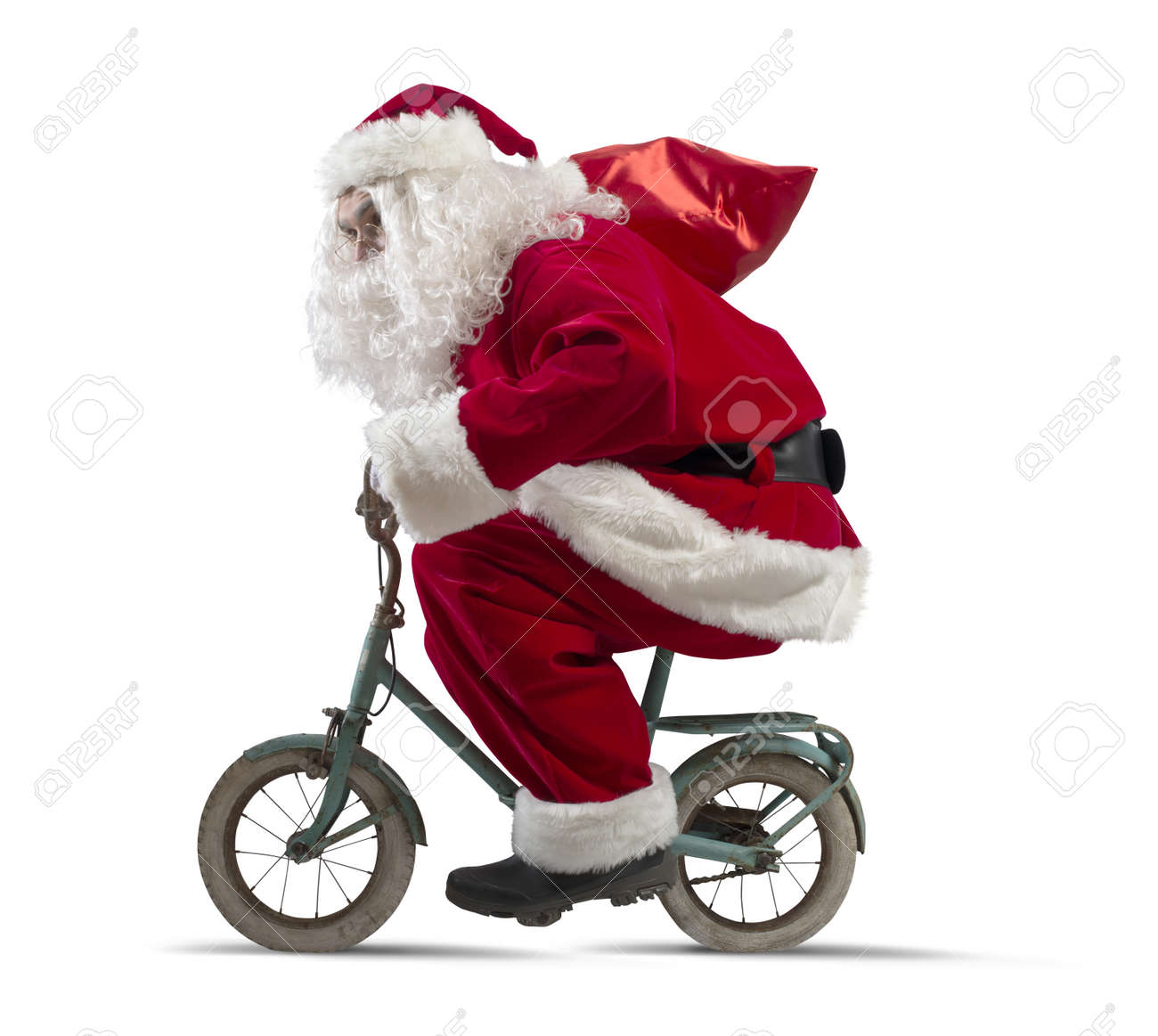 Weihnachtsmann Auf Dem Fahrrad Auf Weissem Hintergrund Lizenzfreie Fotos Bilder Und Stock Fotografie Image 22501471