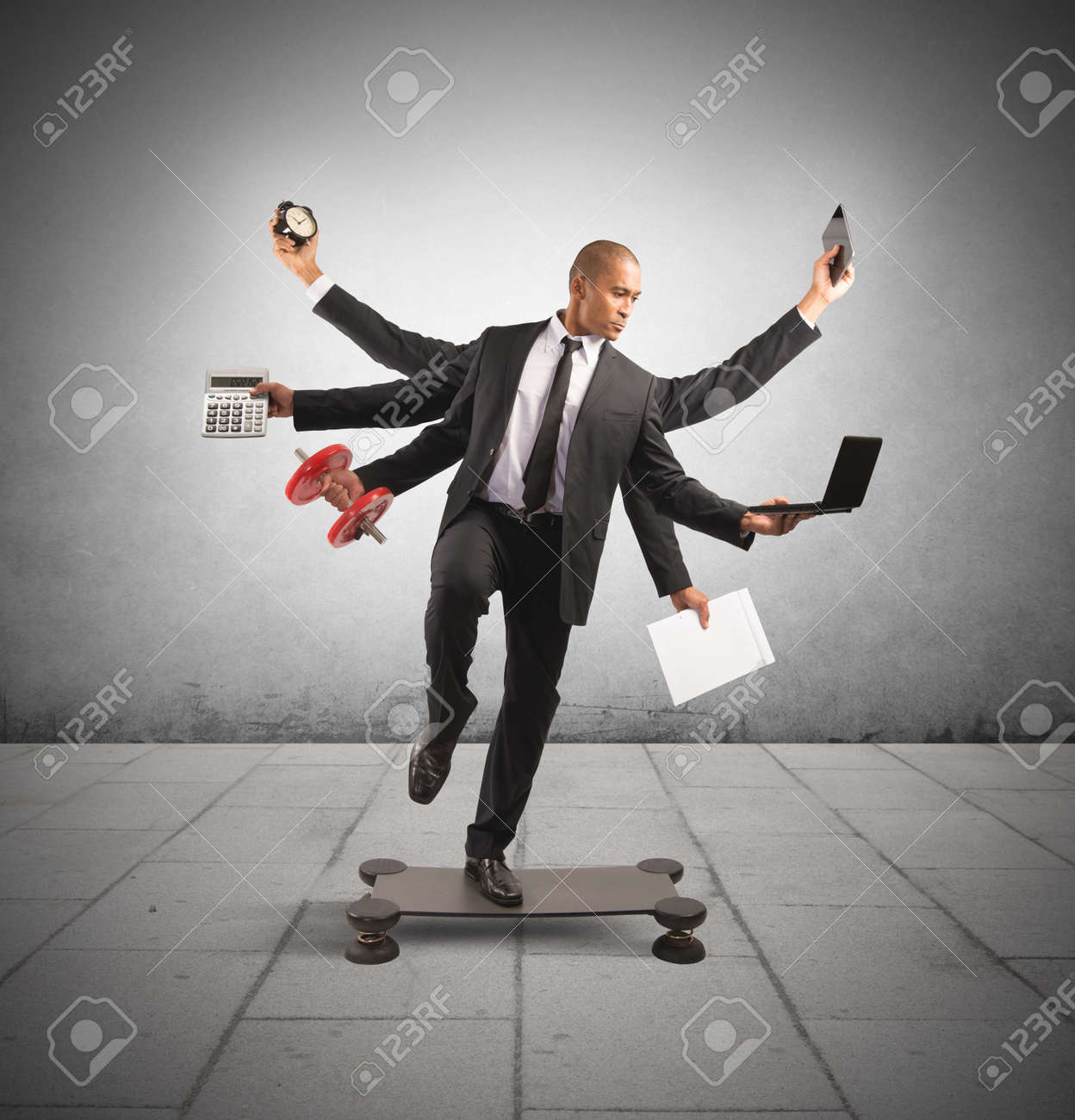 Multitasking concept with businessman at work doing gymnastics - 27430415 Multitasking concept with businessman at work doing gymnastics - 27430415