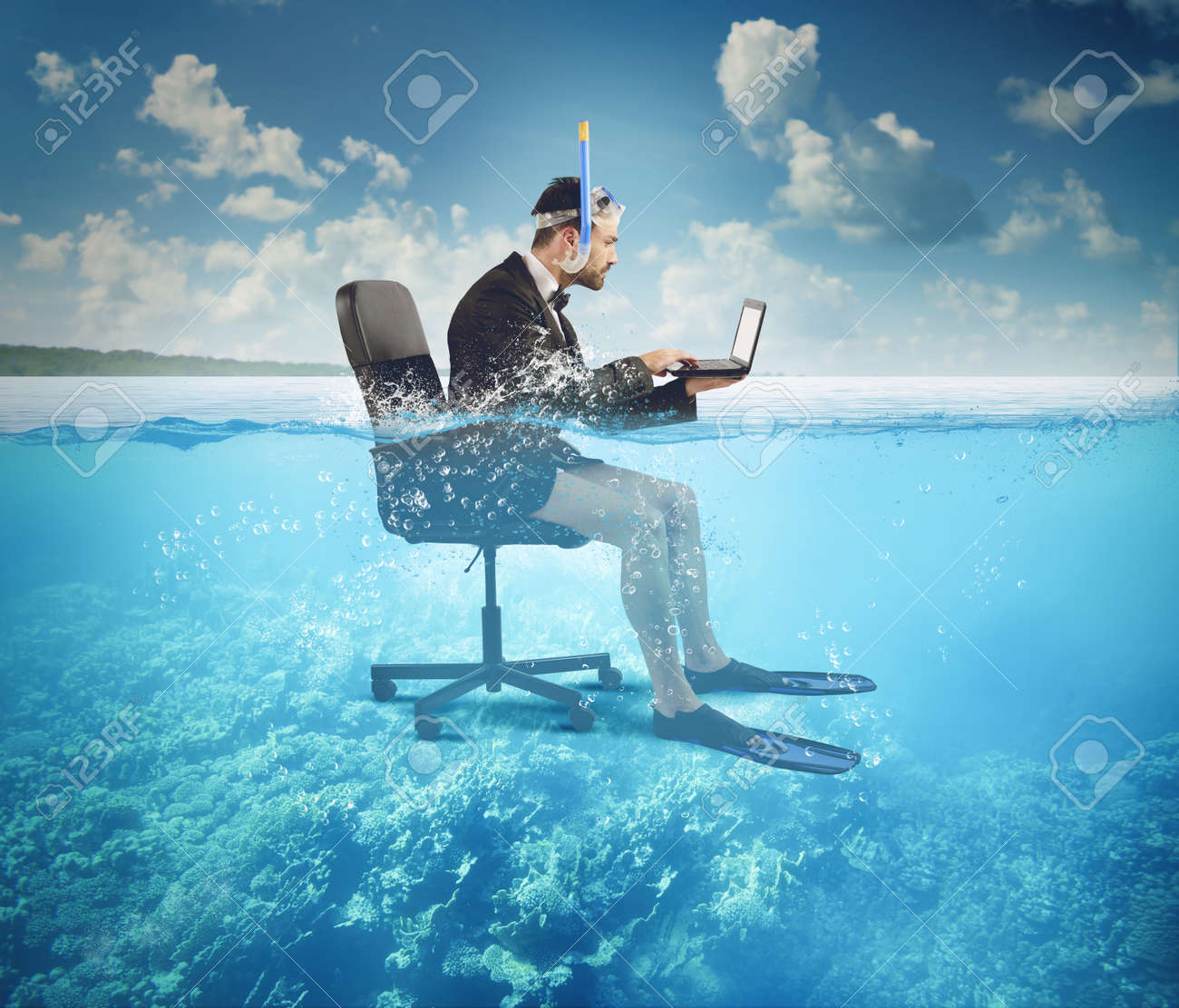 Businessman working on vacation even at sea - 34404654 Businessman working on vacation even at sea - 34404654