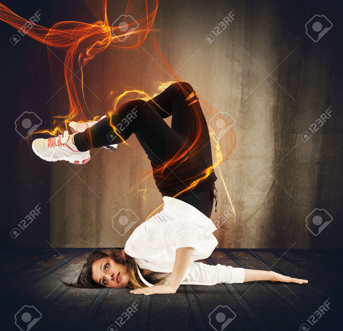Agile Breakdancer Girl Surrounded By Fire Effect