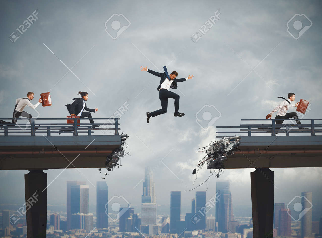 Business People Overcome A Broken Bridge With A Big Jump Stock Photo Picture And Royalty Free Image Image