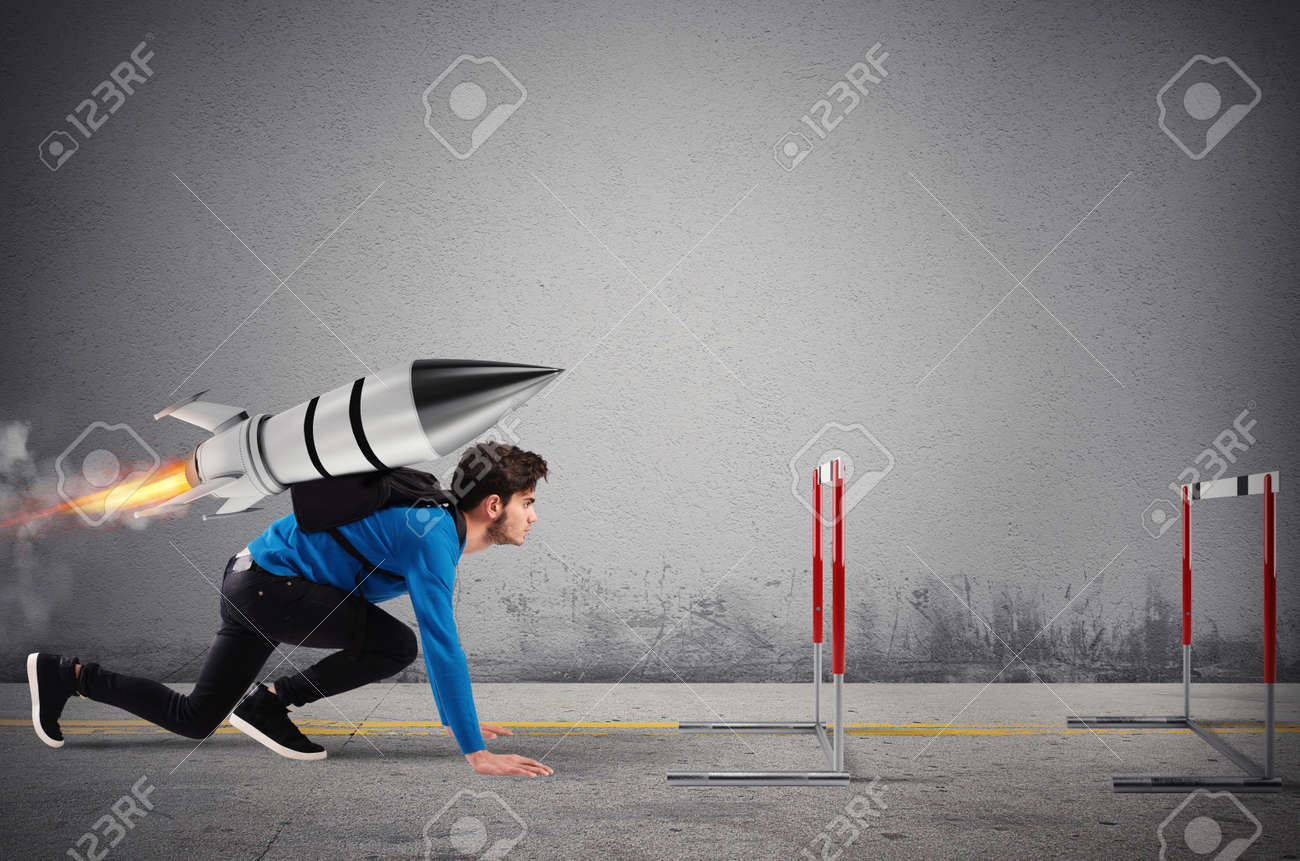 Student overcomes obstacles of his studies at top speed with a rocket - 134891664 Student overcomes obstacles of his studies at top speed with a rocket - 134891664