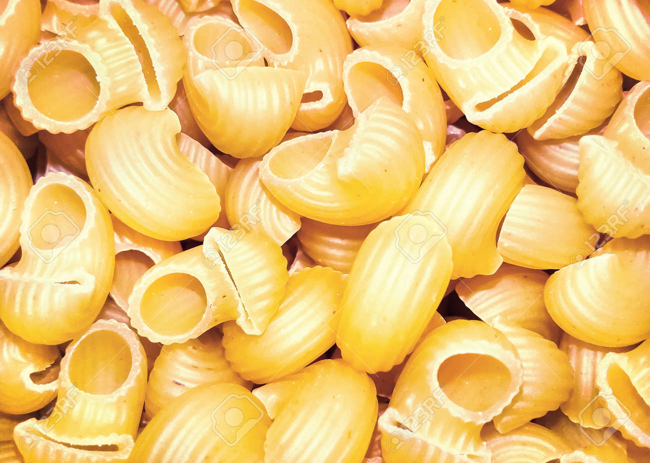 Download Closeup View Of A Bunch Of Dry Uncooked Pasta Pipe Rigate Stock Photo Picture And Royalty Free Image Image 131572077 Yellowimages Mockups
