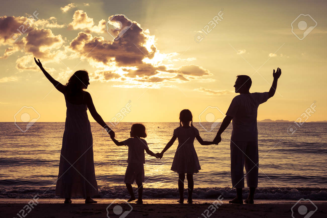 Silhouette Of Happy Family Who Playing On The Beach At The Sunset Time.  Concept Of Friendly Family. Stock Photo, Picture and Royalty Free Image.  Image 35426733., image size:1300x867