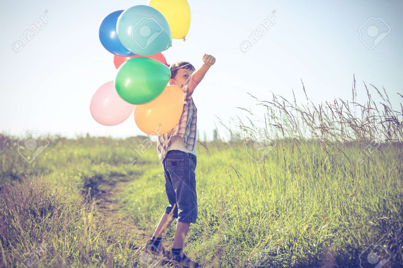 Happy Little Boy On Road At The Day Time He Running In The Field Happy Little Boy On Road At The Day Time He Running In The Field