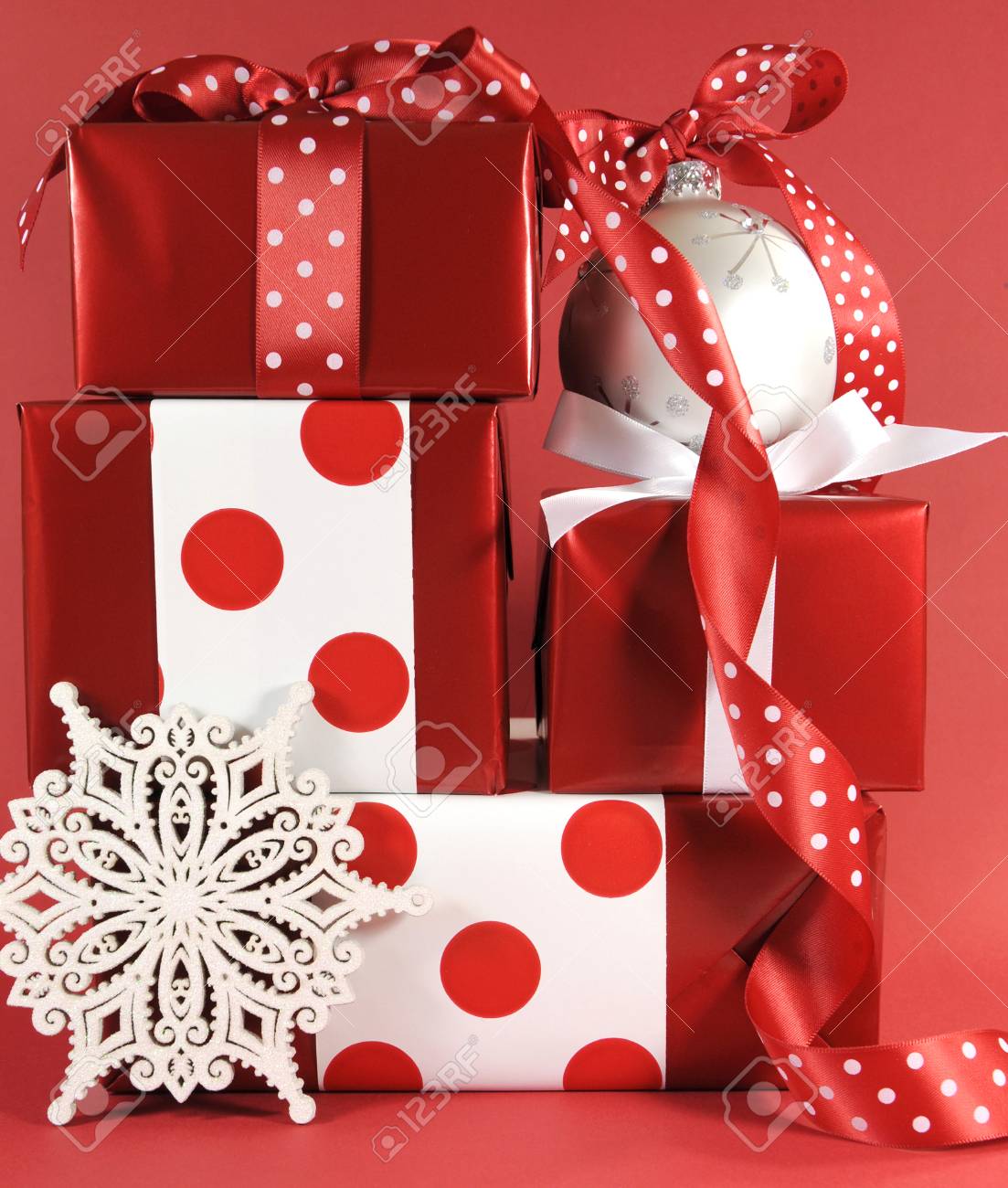 Stack Of Red And White Polka Dot Theme Festive Gift Box Presents With  Christmas Ornaments. Stock Photo, Picture And Royalty Free Image. Image  24495463.