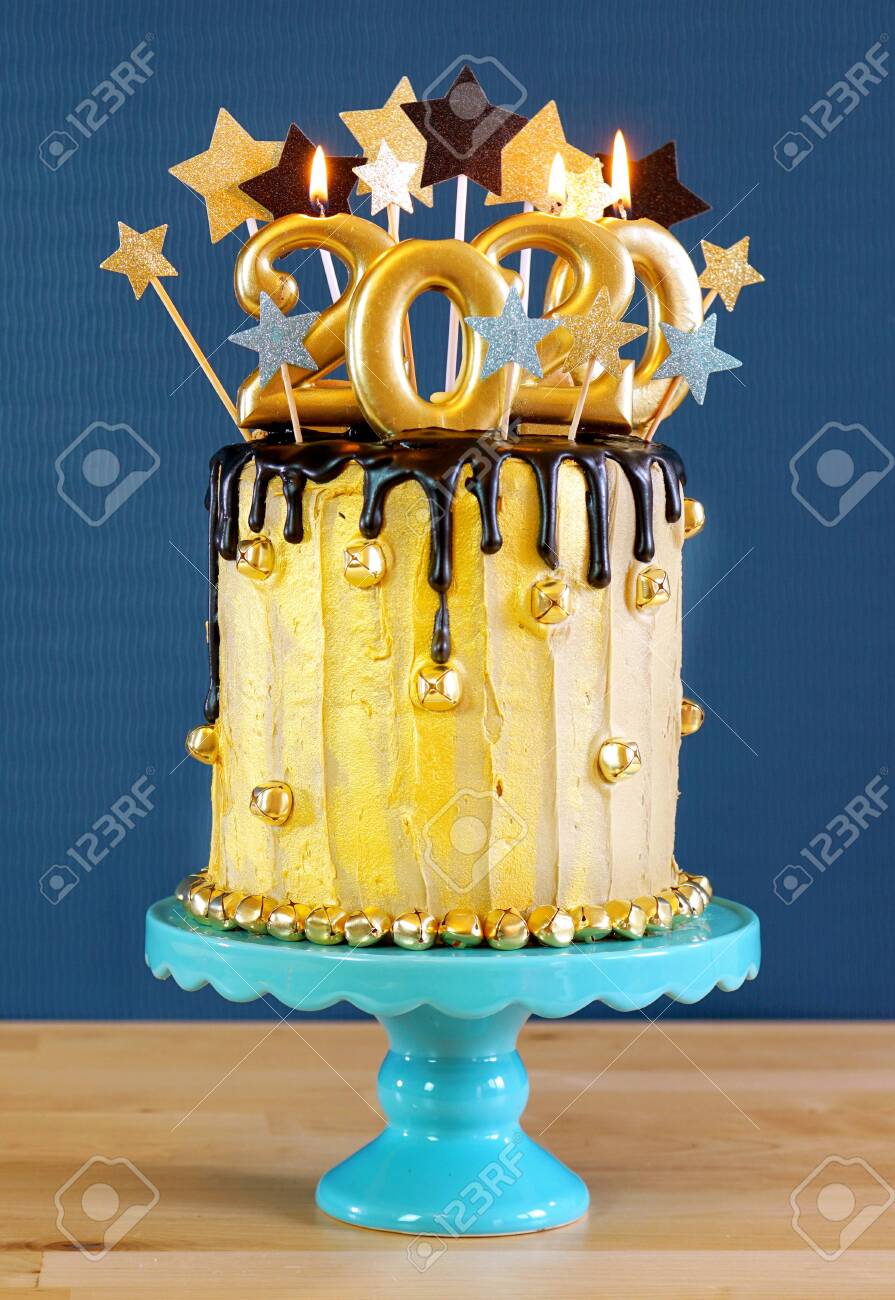 Happy New Year S Eve Black And Gold Drip Cake On A Modern Stock Photo Picture And Royalty Free Image Image
