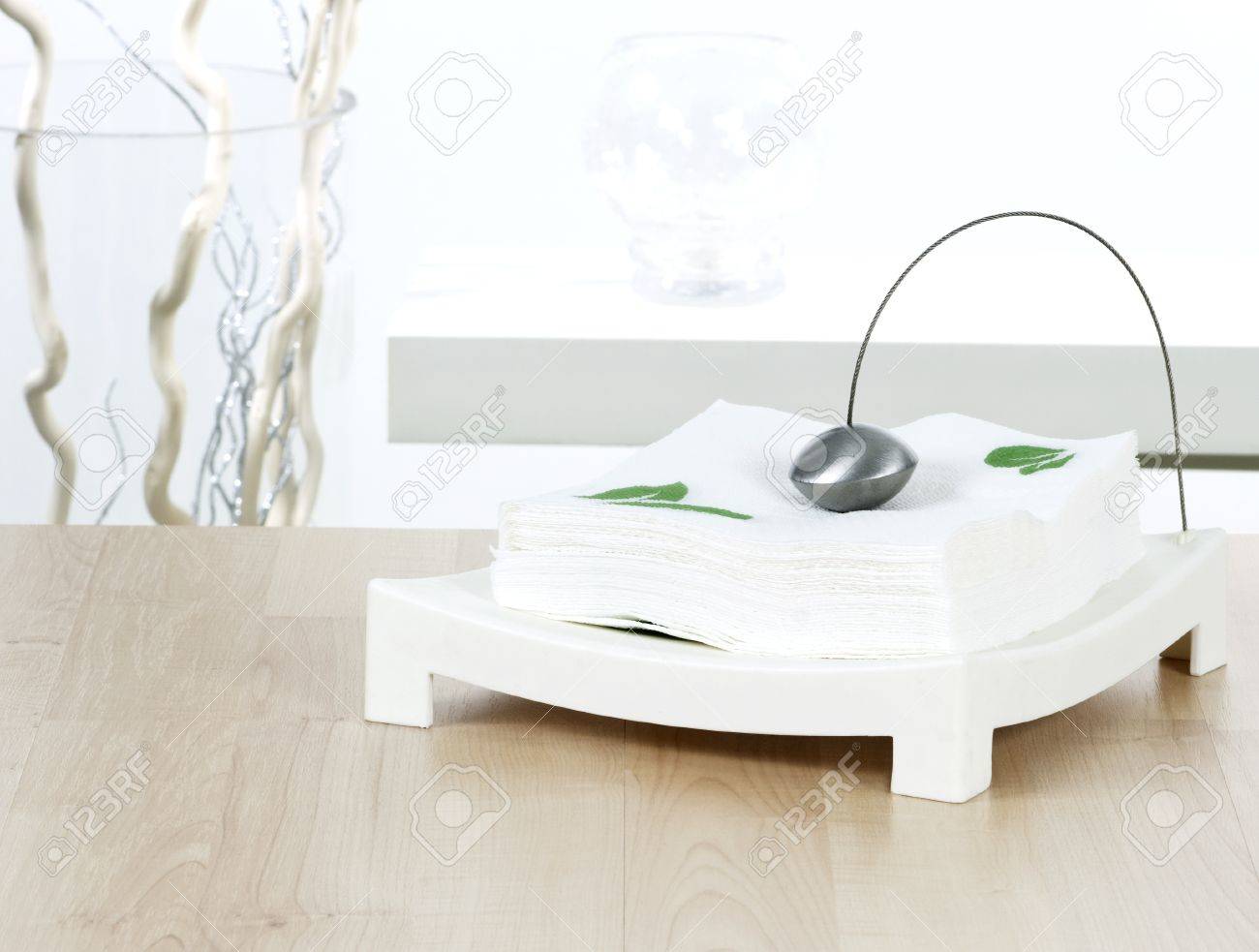 Modern Paper Napkin Holder On A Dining Table Stock Photo Picture - Modern Paper Napkin Holder On A Dining Table Stock Photo modern paper napkin holder on a dining table stock photo picture - modern paper napkin holder on a dining table stock photo