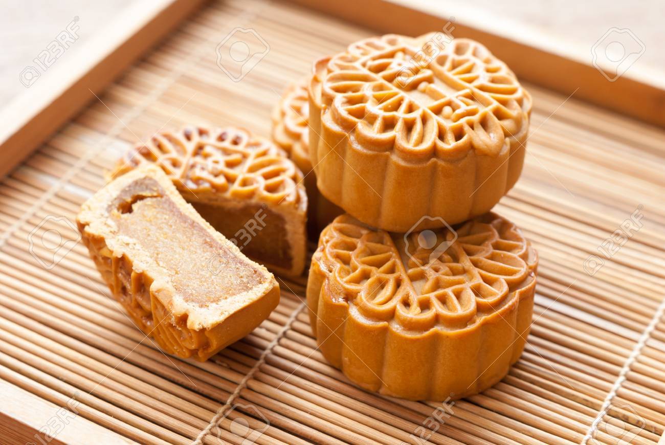 Mid-Autumn Festival moon cake on wooden board - 36719824 Mid-Autumn Festival moon cake on wooden board - 36719824